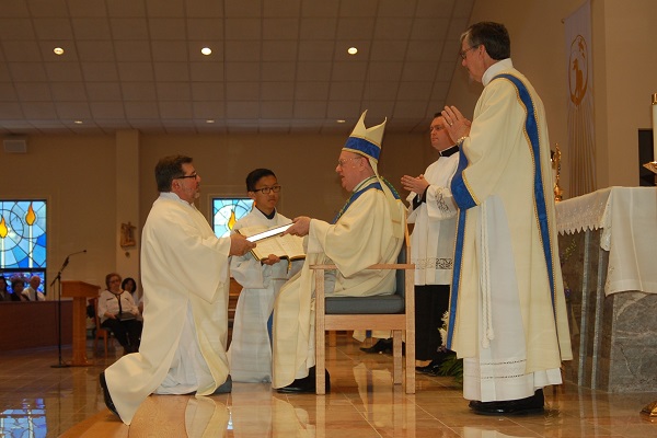 Bishop with newly-ordained Deacon Robert Iuliucci