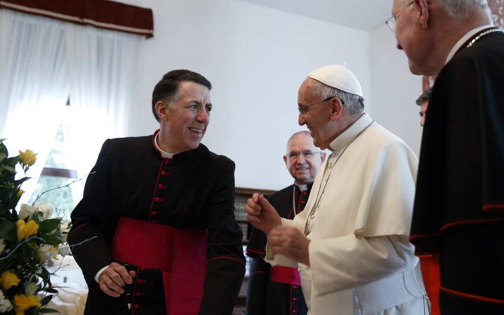 Pope Francis talks with Msgr. James F. Checchio, rector of the Pontifical North American College, as he arrives to celebrate Mass at the college in Rome May 2. It was the first papal visit to the U.S. seminary since 1980. At the end of Mass, Pope Francis said the visit to the seminary was "a beautiful and meaningful introduction to my apostolic visit to the United States of America." (CNS photo/Paul Haring) See POPE-NAC and SERRA-NAC May 2, 2015.