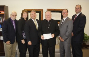Pictured are James Lanahan - Director of Development, Sheila McGirl - Associate Director of Development, Mike Scott - Mutual of America, Bishop Dennis Sullivan, Tom Moller and Justin Roy of Mutual of America.