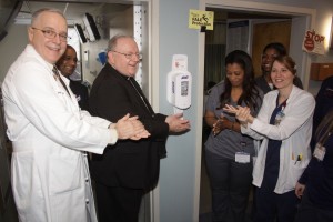 Bishop Dennis Sullivan has always been a proponent of good germ management and was happy to follow the rules on hand washing while at the hospital.