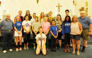 Summer in the City participants and adult leaders pose for a photo after Mass at Christ the Good Shepherd Parish, Vineland, on June 30. The group stayed at John Paul II Retreat Center in Vineland for a week of service, prayer and learning. Photo by Alan M. Dumoff
