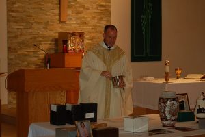 msgr-pete-joyce-blessing-cremated-remains-web